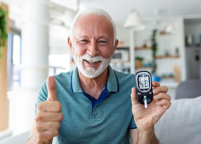 smiling man with cgm